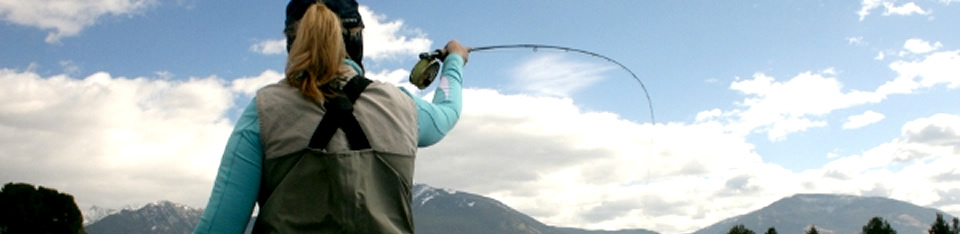 Woman angler with a fish on
